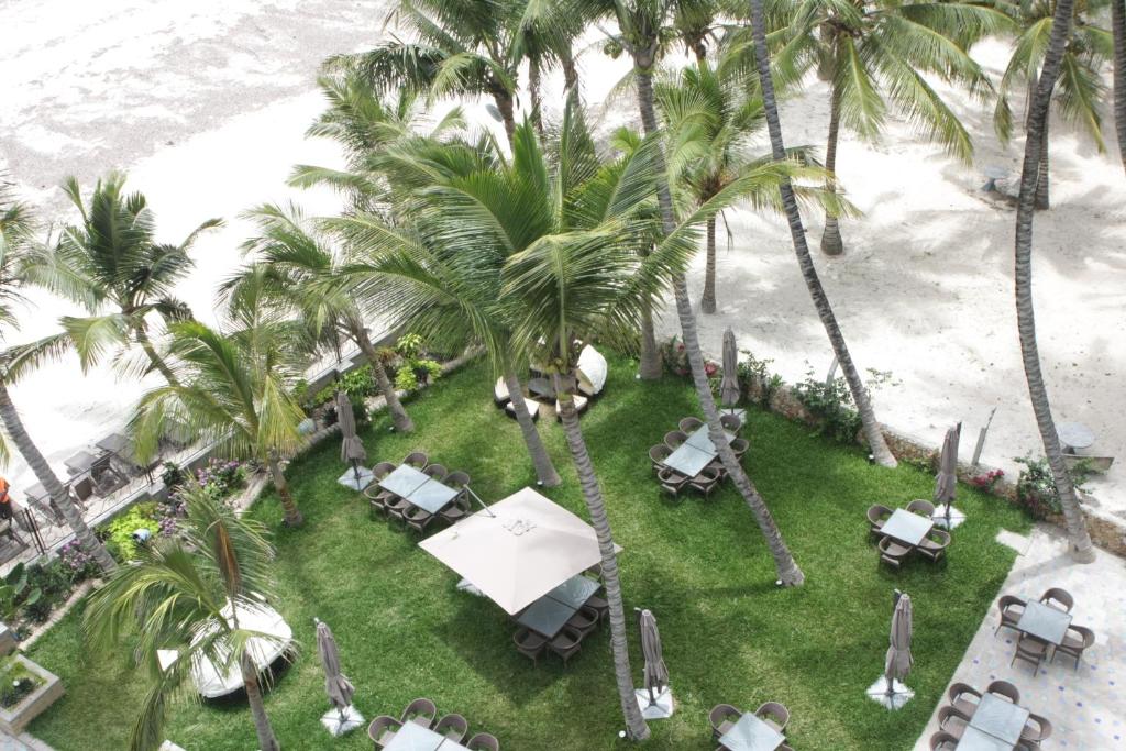 Cowrie Shell Beach Apartments Official